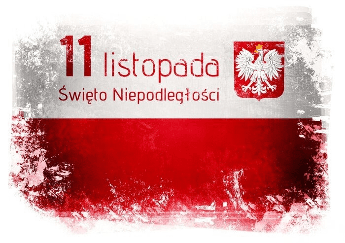 Flaga Polski z napisem „11 listopada – Dzień Niepodległości”. Grafika promująca wydarzenie patriotyczne w przedszkolu.